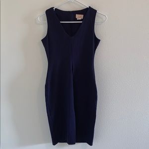 Navy dress with slight in middle